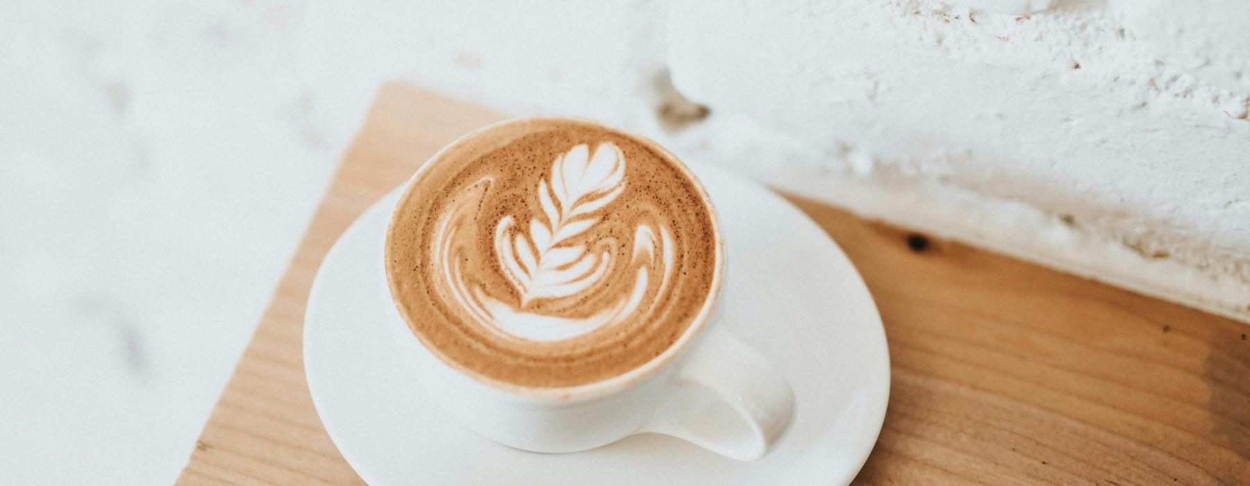 a cup of coffee on a table